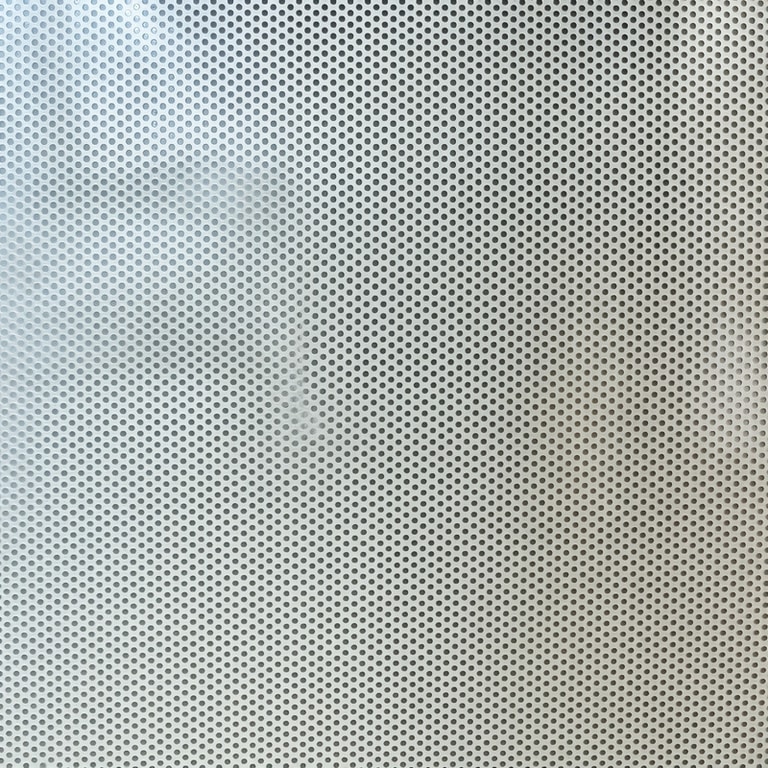 Vinilo microperforado para una superficie acristalada